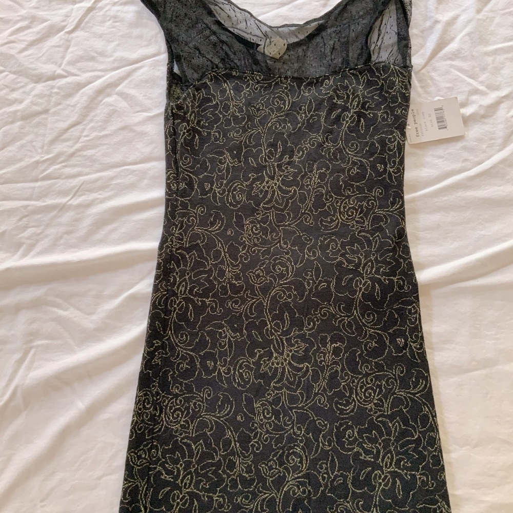 FREE PEOPLE BLACK DRESS WITH LACE ACCENT.